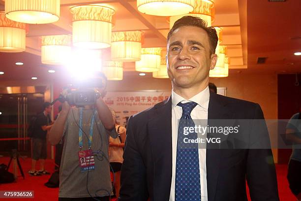 Fabio Cannavaro, Italy's World Cup winning captain and chief coach of Guangzhou Evergrande Taobao Football Club, says farewells with football fans...