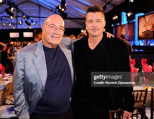 Producer Arnon Milchan and actor Brad Pitt pose during the 2014 Film Independent Spirit Awards at Santa Monica Beach on March 1, 2014 in Santa...