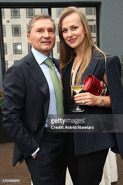 Gary Flom and Svetlana Flom pose for photos during the Roger Dubuis 20th Anniversary held at the Pennisula Hotel on June 4, 2015 in New York City.