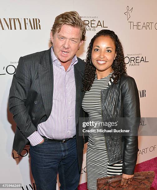 Director Rupert Wainwright and guest attend D.J. Night with L'Oreal Paris during Vanity Fair Campaign Hollywood at Sadie Kitchen and Lounge on...