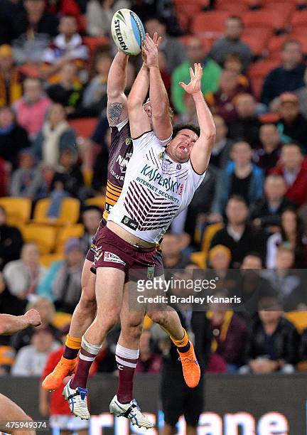 Jack Reed of the Broncos and Jamie Lyon of the Sea Eagles compete for the ball during the round 13 NRL match between the Brisbane Broncos and the...