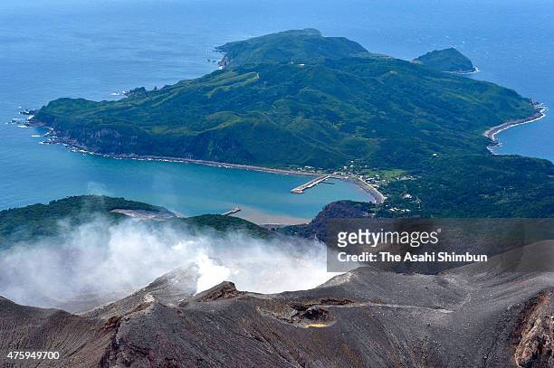 In this aerial image, volcanic smoke continues to rise from Mount Shindake of Kuchinoerabu Island on June 4, 2015 in Yakushima, Kagoshima, Japan....