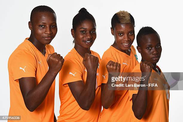 Sandrine Niamien, Rebecca Elloh, Ines Nrehy and Ange Nguessan of Cote d'Ivoire pose during the FIFA Women's World Cup 2015 portrait session at...