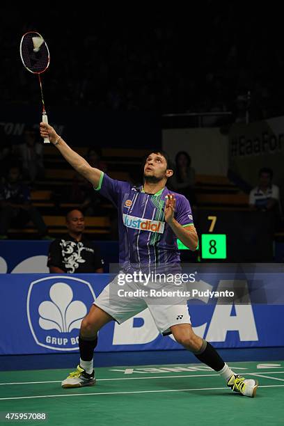 Parupalli Kashyap of India returns a shot against Chen Long of China during the 2015 BCA Indonesia Open Quarterfinals match at Istora Senayan on June...