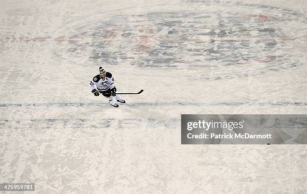 Sidney Crosby of the Pittsburgh Penguins skates during warmups prior to the 2014 NHL Stadium Series game against the Chicago Blackhawks on March 1,...