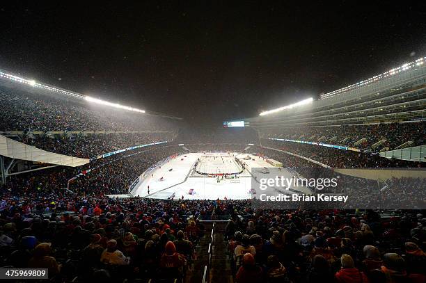 The Chicago Blackhawks play the Pittsburgh Penguins during the third period of the 2014 Coors Light NHL Stadium Series game at Soldier Field on March...