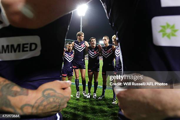 Matthew Pavlich of the Dockers speaks to the huddle at the start of the game during the round 10 AFL match between the Fremantle Dockers and the...