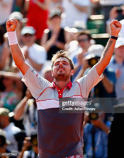 Stanislas Wawrinka of Switzerland celebrates winning the Men's Semi Final against Jo-Wilfried Tsonga of France on day thirteen of the 2015 French...