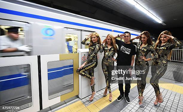 And dancers pose for a photograph during SEIBU RAILWAY PRESENTS ageHa TRAIN on June 5, 2015 in Tokyo, Japan. The Seibu Railway Company, Ltd. And the...