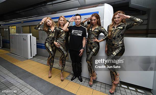 And dancers pose for a photograph during SEIBU RAILWAY PRESENTS ageHa TRAIN on June 5, 2015 in Tokyo, Japan. The Seibu Railway Company, Ltd. And the...
