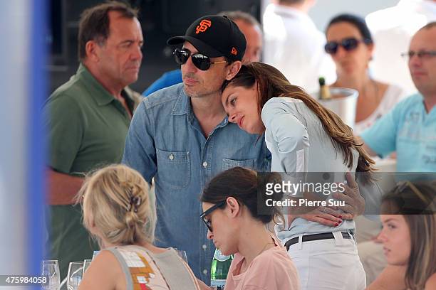 Charlotte Casiraghi and Gad Elmaleh attend the Longines Athina Onassis horse Show on June 5, 2015 in Saint-Tropez, France.