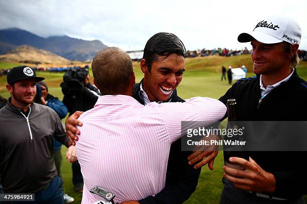 Dimitrios Papadatos of Australia celebrates with friends after winning the New Zealand Open at The Hills Golf Club on March 2, 2014 in Queenstown,...