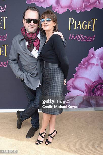 Co-founder and CEO of Propaganda GEM Andrews Granath and PR Manager of Piaget Natacha Hertz pose in the Piaget Lounge during the 2014 Film...