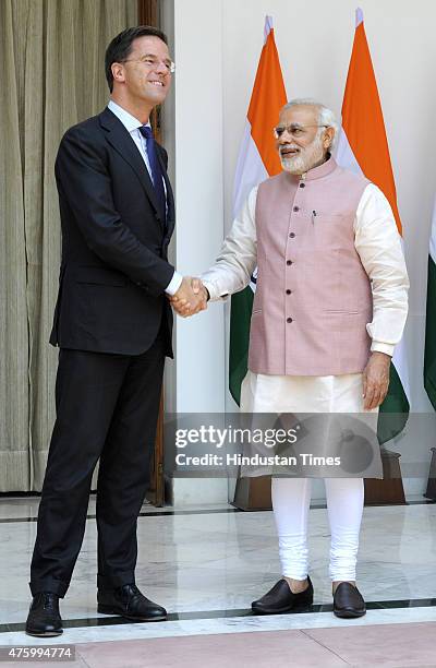 Prime Minister Narendra Modi shakes hands with his Netherland counterpart Mark Rutte before a meeting at Hyderabad House on June 5, 2015 in New...