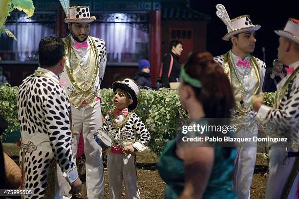 Percussionist of 'Danzarines Canarios' troupe chat before perfoming in the troupes dancing contest during the Santa Cruz de Tenerife Carnival on...