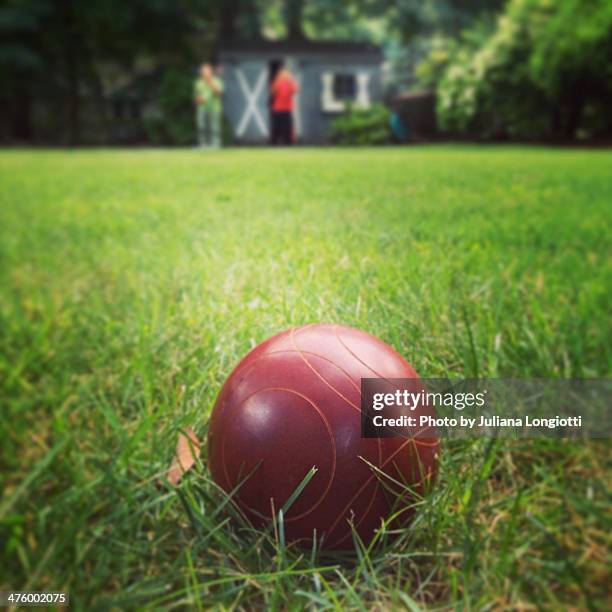 backyard game of bocce ball - bocce ball stock pictures, royalty-free photos & images