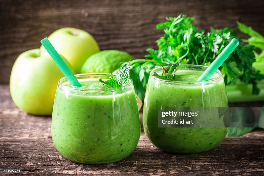 Green Detox smoothie on wooden table