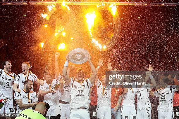 Filip Jicha of Kiel celebrate with the trophy wit his teamates after the DKB HBL Bundesliga match between THW Kiel and TBV Lemgo at Sparkassen Arena...