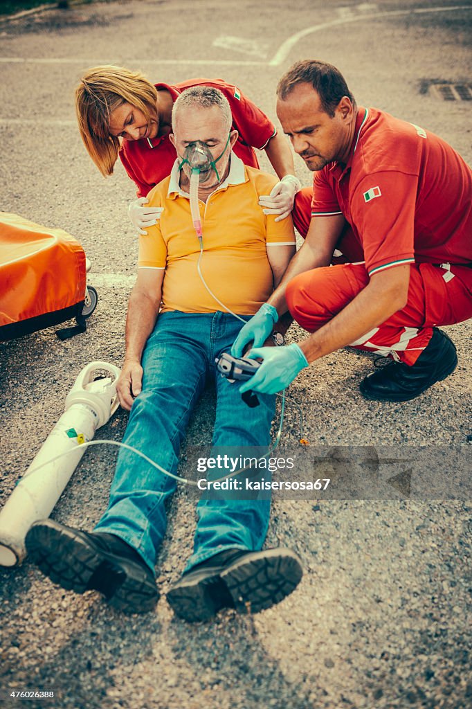 Rescue Team Providing First Aid High-Res Stock Photo - Getty Images