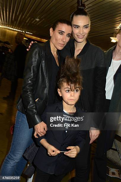 Blanca Li, model Marie Meyer and her son attend the Jean Paul Gaultier Show as part of the Paris Fashion Week Womenswear Fall/Winter 2014-2015 at...