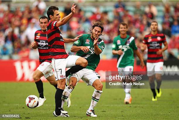 Labinot Haliti of the Wanderers collides with Joshua Brillante of the Jets during the round 21 A-League match between the Western Sydney Wanderers...