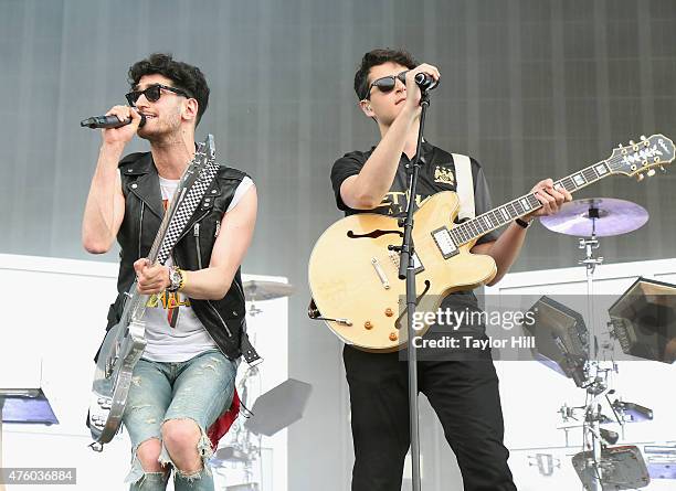 David Macklovitch of Chromeo and Ezra Koenig of Vampire Weekend perform onstage during the 2015 Governors Ball Music Festival at Randall's Island on...