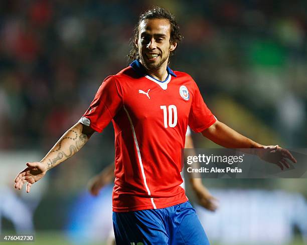Jorge Valdivia of Chile celebrates after scoring the first goal of his team during a friendly match between Chile and El Salvador at El Teniente de...