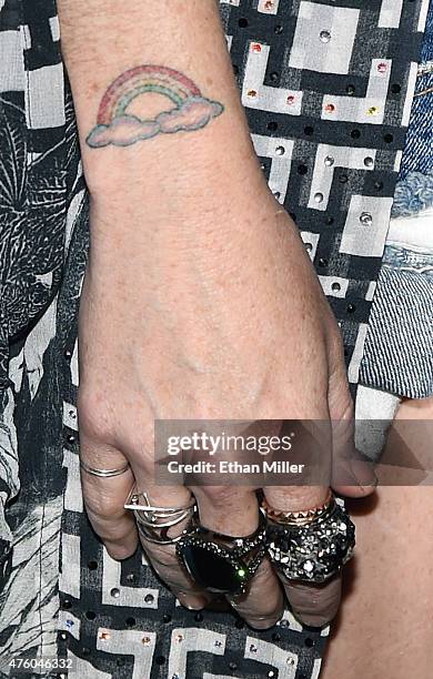 Actress/recording artist Taryn Manning, tattoo and rings details, attends Ditch Fridays at Palms Pool & Dayclub on June 5, 2015 in Las Vegas, Nevada.