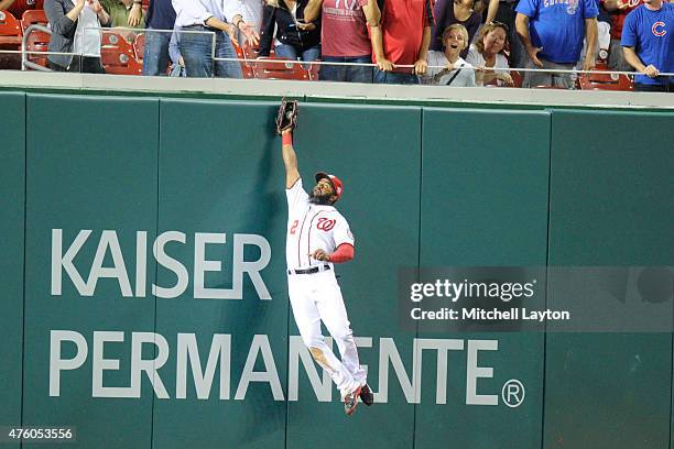 Denard Span of the Washington Nationals catches a fly ball hit by Anthony Rizzo of the Chicago Cubs in the eighth inning during a baseball game at...