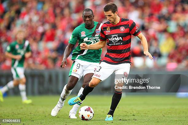 Matthew Spiranovic of the Wanderers competes with Emile Heskey of the Jets during the round 21 A-League match between the Western Sydney Wanderers...