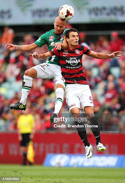 Ruben Zadkovich of the Jets competes with Labinot Haliti of the Wanderers during the round 21 A-League match between the Western Sydney Wanderers and...