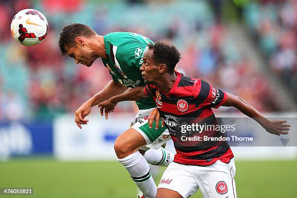 Samuel Gallaway of the Jets competes with Youssouf Hersi of the Wanderers during the round 21 A-League match between the Western Sydney Wanderers and...