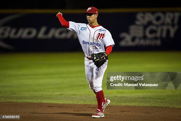 Ramon Urias second base of Diablos Rojos throws a ball during a match between Acereros de Monclova and Diablos Rojos as part of Mexican Baseball...