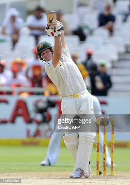 Australia's batsman Steven Smith plays a shot on day 2 of the third test match between South Africa and Australia at Newlands stadium in Cape Town on...