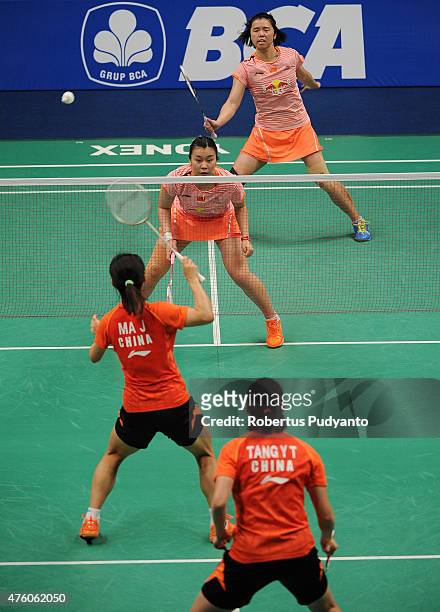 Tang Jinhua and Tian Qing of China play a shot against Ma Jin and Tang Yuanting of China during the 2015 BCA Indonesia Open Semifinals match at...