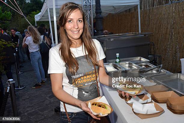 Guest presents the kielbasa saussage of Chef Isaac McHale during the Fooding 15th Anniversary Party Day One at La Rotonde Stalingrad on June 5, 2015...