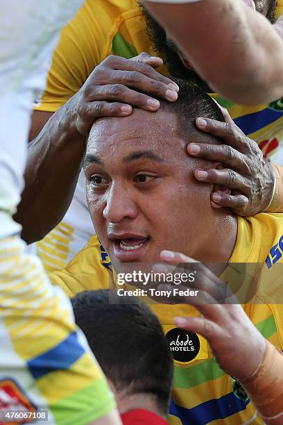 Josh Papalii of the Raiders is congratulated after scoring a try during the round 13 NRL match between the Newcastle Knights and Canberra Raiders at...