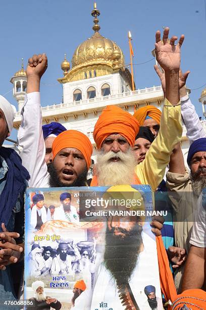 Indian Sikh activists from radical Sikh organisations shout slogans in support of Sikh leader Sant Jarnail Singh Bhindranwale and Khalistan, the name...