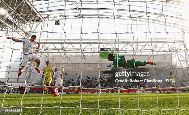 Andre Silva of Portugal heads the ball past Colombian goalkeeper Alvaro Montero to score during the FIFA U-20 World Cup New Zealand 2015 Group C...