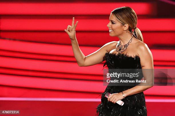 Host Sylvie Meis gestures during the final show of the television competition 'Let's Dance' on June 5, 2015 in Cologne, Germany.
