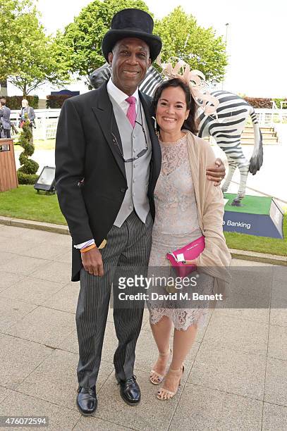 Michael Holding and Laurie-Ann Holding attends Derby Day during the Investec Derby Festival at Epsom Racecourse on June 6, 2015 in Epsom, England.