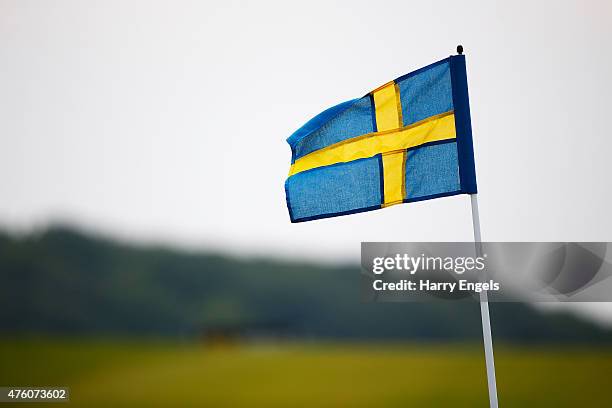 The pin flags are replaced with Swedish flags to mark Sweden's National Day on day three of the Nordea Masters at the PGA Sweden National on June 6,...