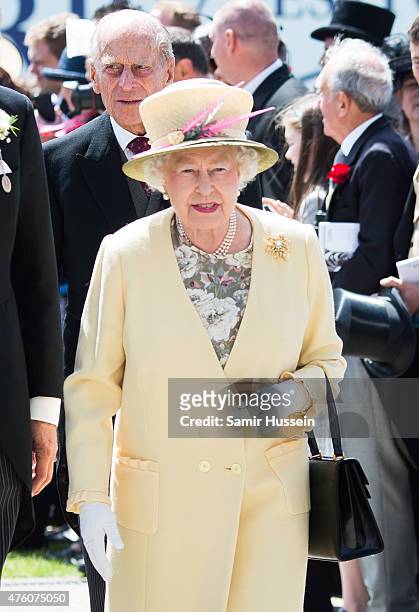 Queen Elizabeth II and Prince Philip, Duke of Edinburgh attend the Epsom Derby at Epsom Racecourse on June 6, 2015 in Epsom, England.