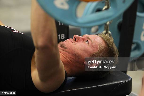 Paul Bittner performs a bench press test during the NHL Combine at HarborCenter on June 6, 2015 in Buffalo, New York.