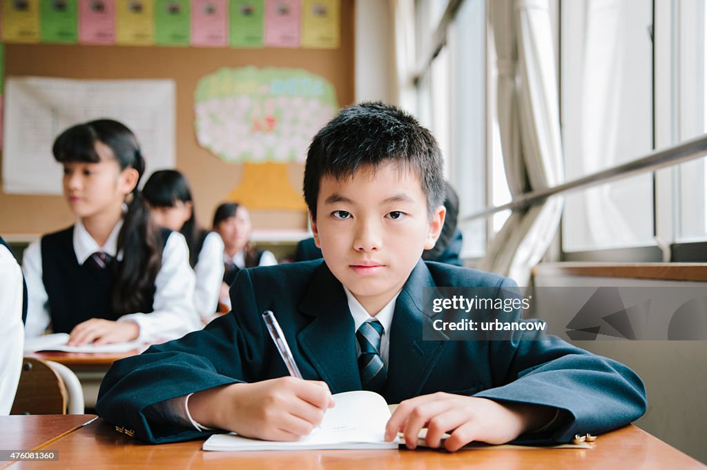 High school student, young male student working in classroom, Japan