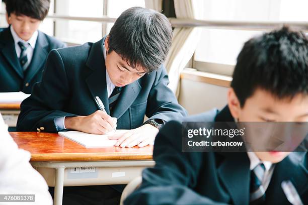 high school students, young male students working in classroom, japan - japanese classroom stock pictures, royalty-free photos & images