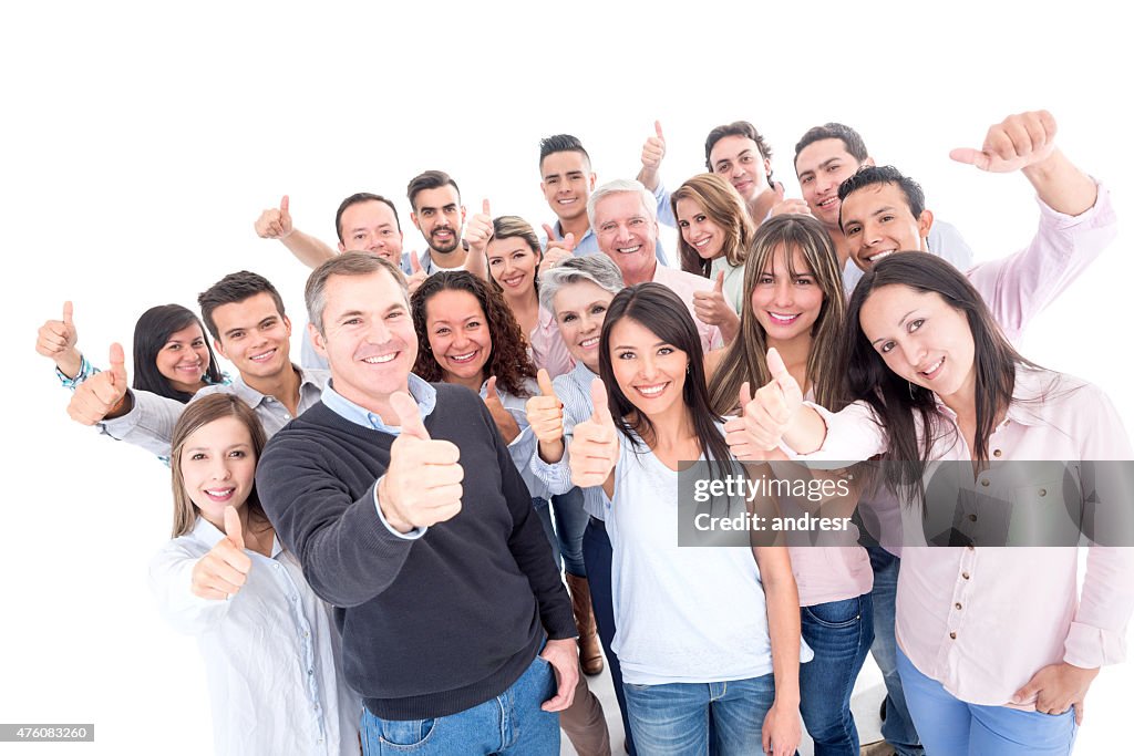 Happy group of people with thumbs up