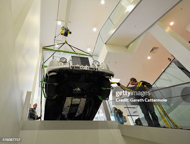 Rolls Royce Silver Cloud ll - Cub 1 used in the film A View To A Kill is loaded in to the London Film Museum ahead of the Bond in Motion exhibition,...