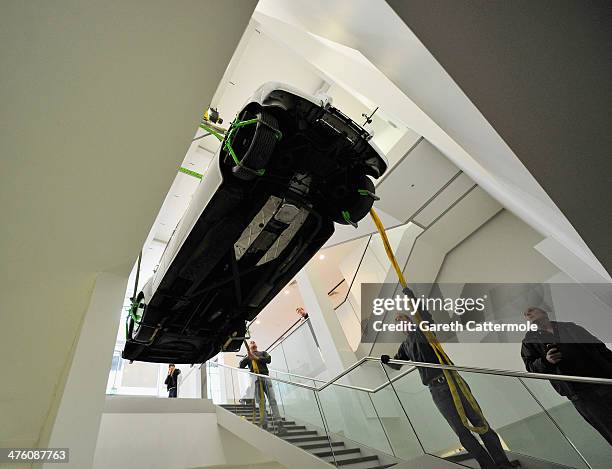 Rolls Royce Silver Cloud ll - Cub 1 used in the film A View To A Kill is loaded in to the London Film Museum ahead of the Bond in Motion exhibition,...