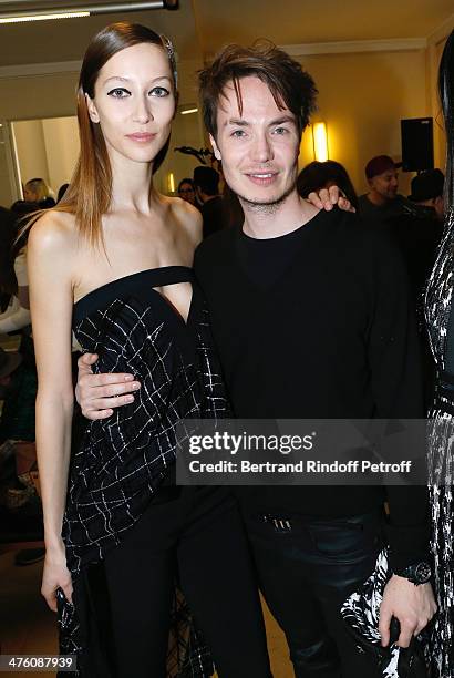 Fashion designer Maxime Simoens poses backstage with model after the Maxime Simoens show as part of the Paris Fashion Week Womenswear Fall/Winter...